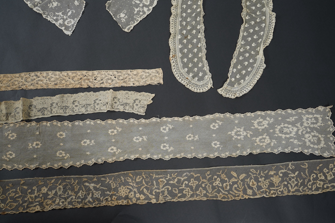 An early 19th bobbin lace length and a Brussels needle lace length, a Brussels bobbin lace wedding hankie and Brussels collar and length of trimming, a needle run collar and similar stole. (7). Brussels bobbin trim 250cm